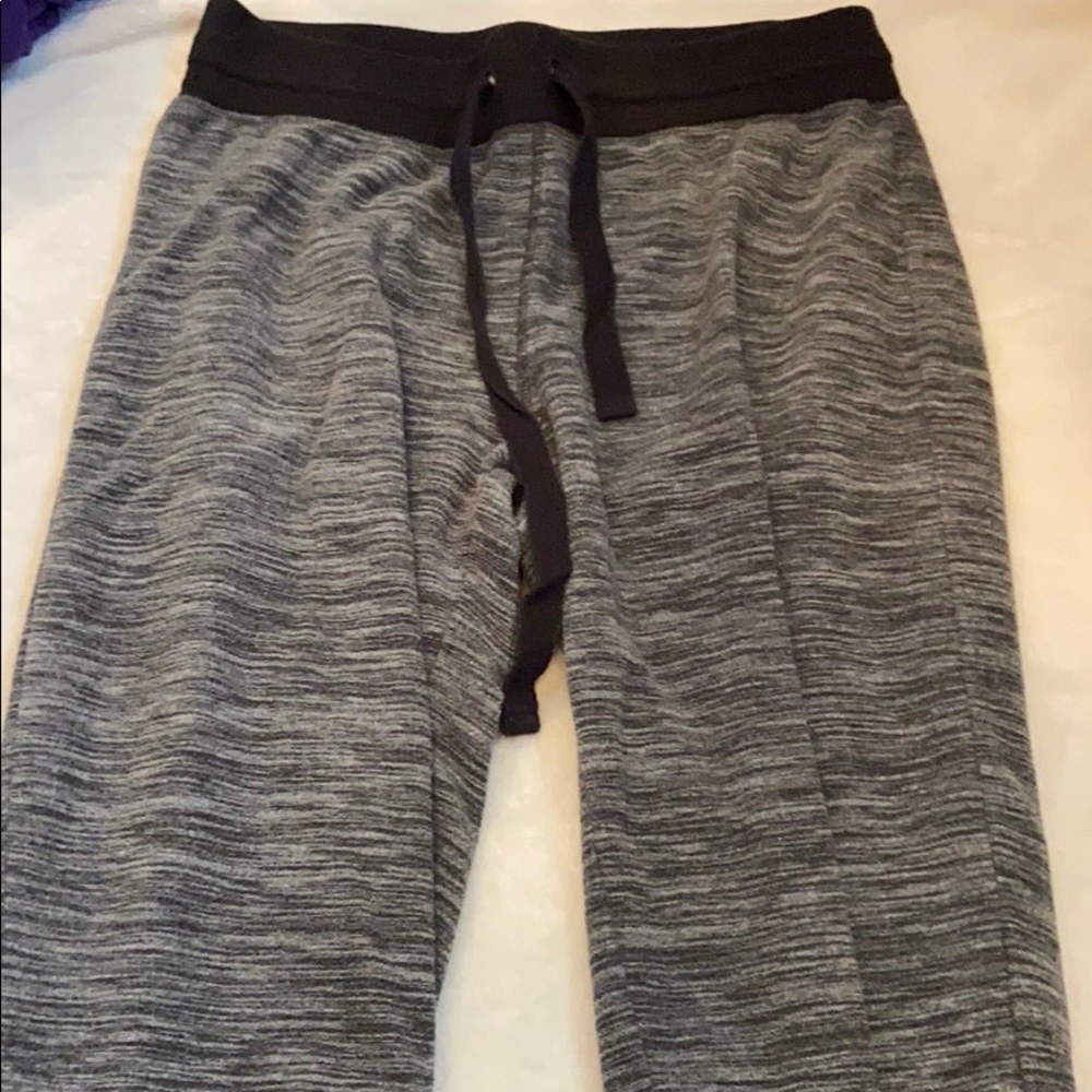 gray and black joggers/ sweats